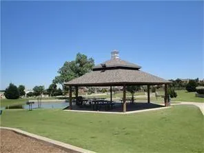 a view of lake with a big yard
