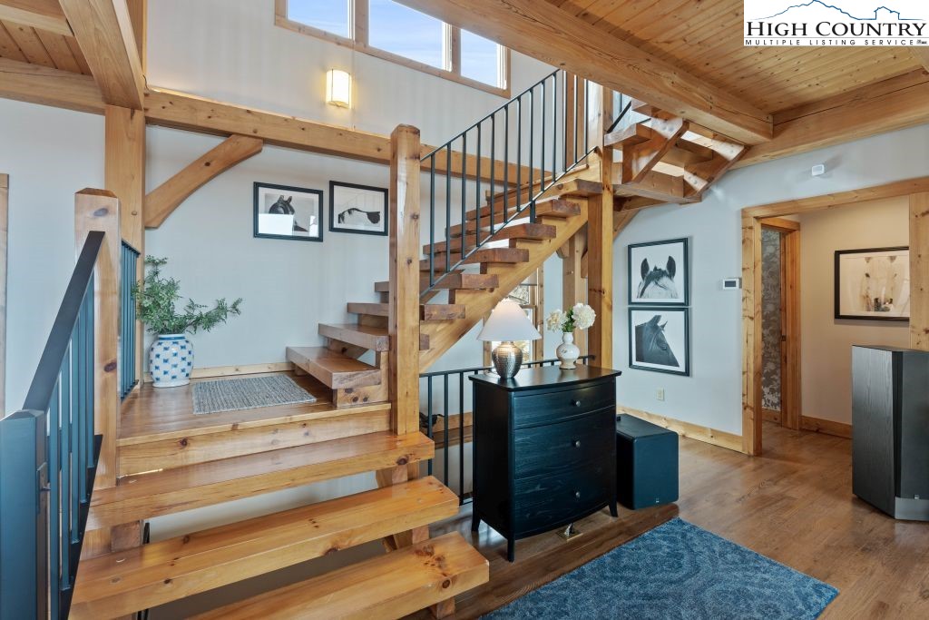 331 May Apple Trail Newland, NC 28657 - Photo 20 of 48 a view of entryway and hall with wooden floor