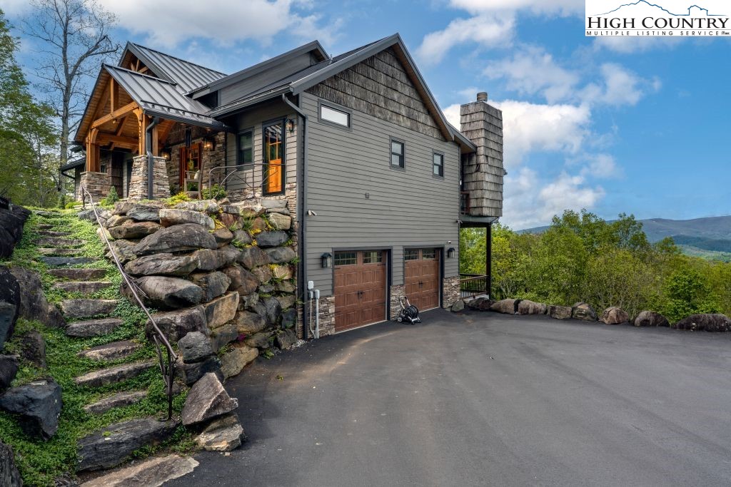 331 May Apple Trail Newland, NC 28657 - Photo 2 of 48 a backyard of a house with lots of green space