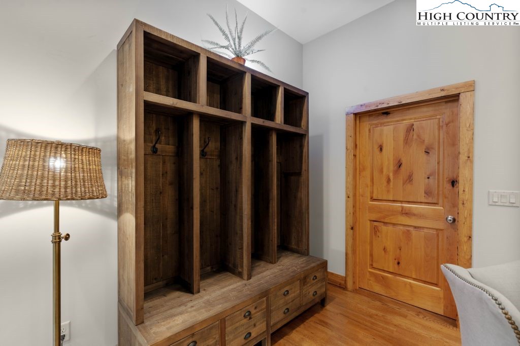 331 May Apple Trail Newland, NC 28657 - Photo 25 of 48 a view of a hallway with wooden floor and cabinet