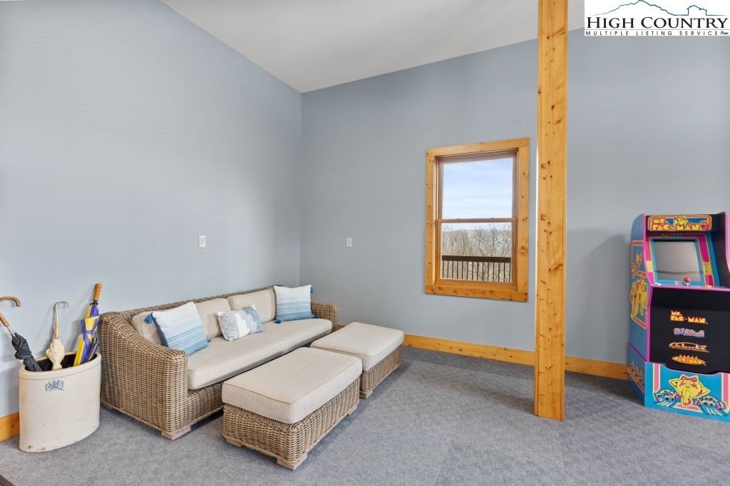 331 May Apple Trail Newland, NC 28657 - Photo 30 of 48 a spacious bedroom with a bed and a window