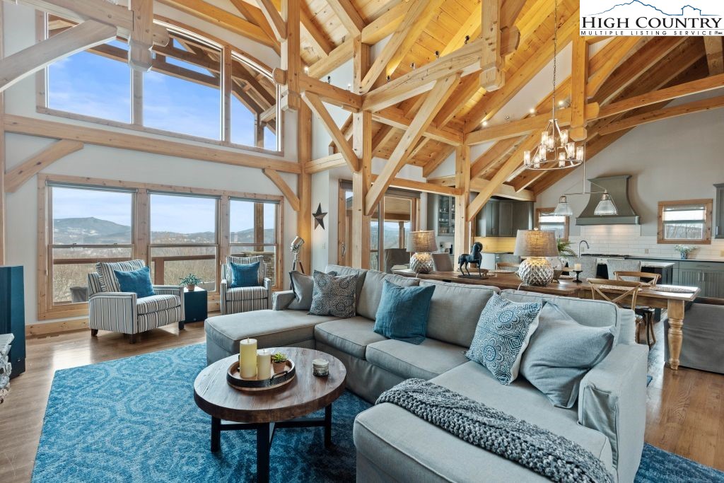 331 May Apple Trail Newland, NC 28657 - Photo 33 of 48 a living room with furniture a rug and a large window