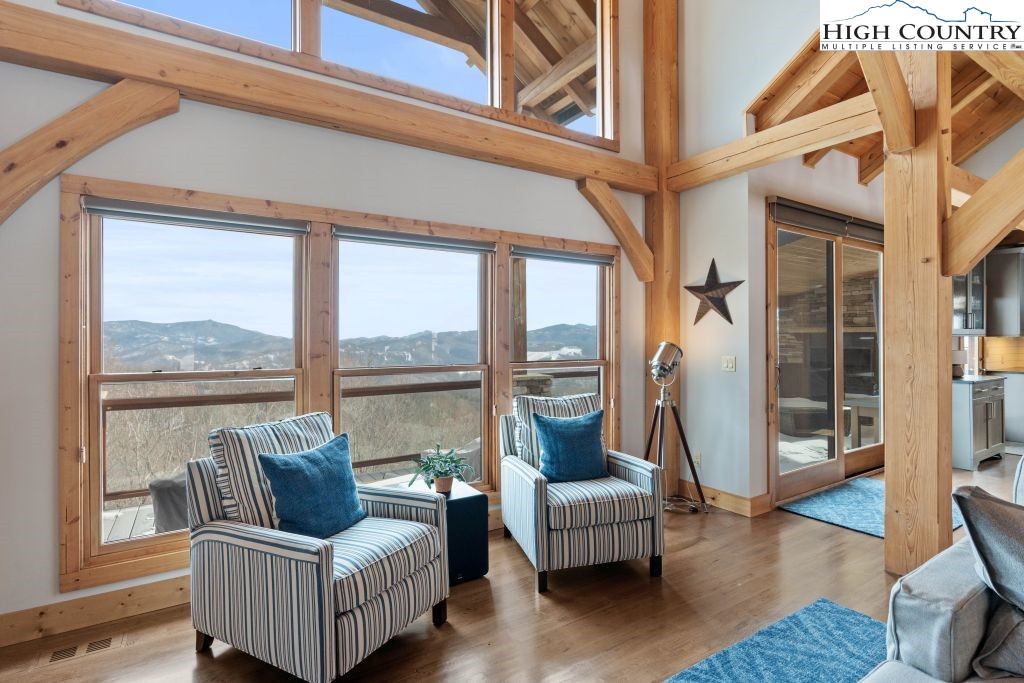 331 May Apple Trail Newland, NC 28657 - Photo 34 of 48 a living room with furniture and a floor to ceiling window