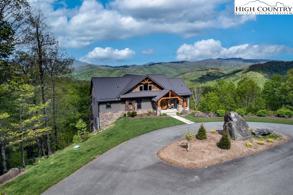 331 May Apple Trail Newland, NC 28657 - Photo 43 of 48 a front view of a house with a yard