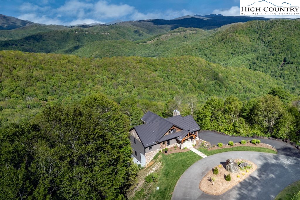331 May Apple Trail Newland, NC 28657 - Photo 44 of 48 an aerial view of a house with a garden