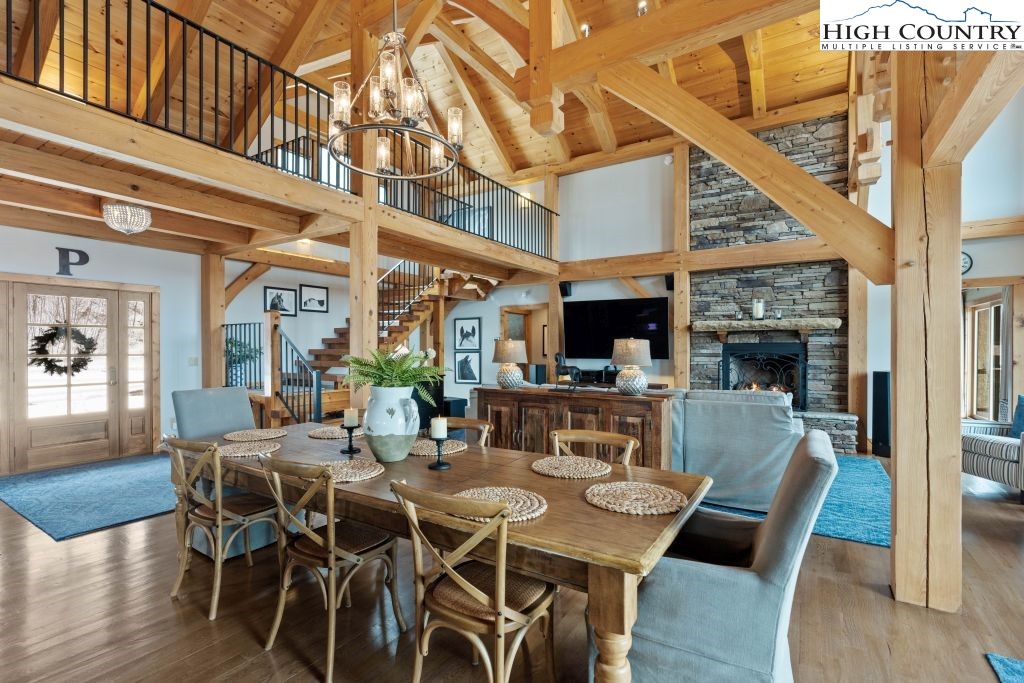 331 May Apple Trail Newland, NC 28657 - Photo 8 of 48 a view of a dining room with furniture window and wooden floor