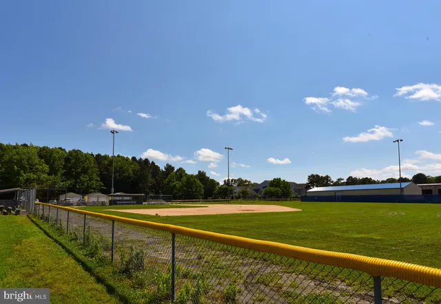 a view of field with trees