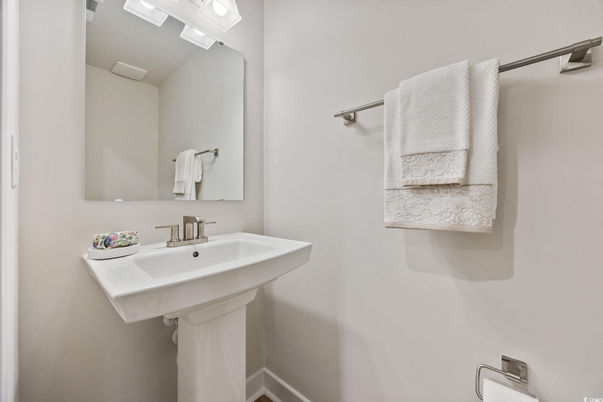 345 Bent Green, Unit 90A Murrells Inlet, SC 29576 - Photo 7 of 39 Bathroom with a sink