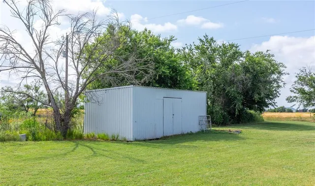 a bathroom with a granite countertop bathtub and sink