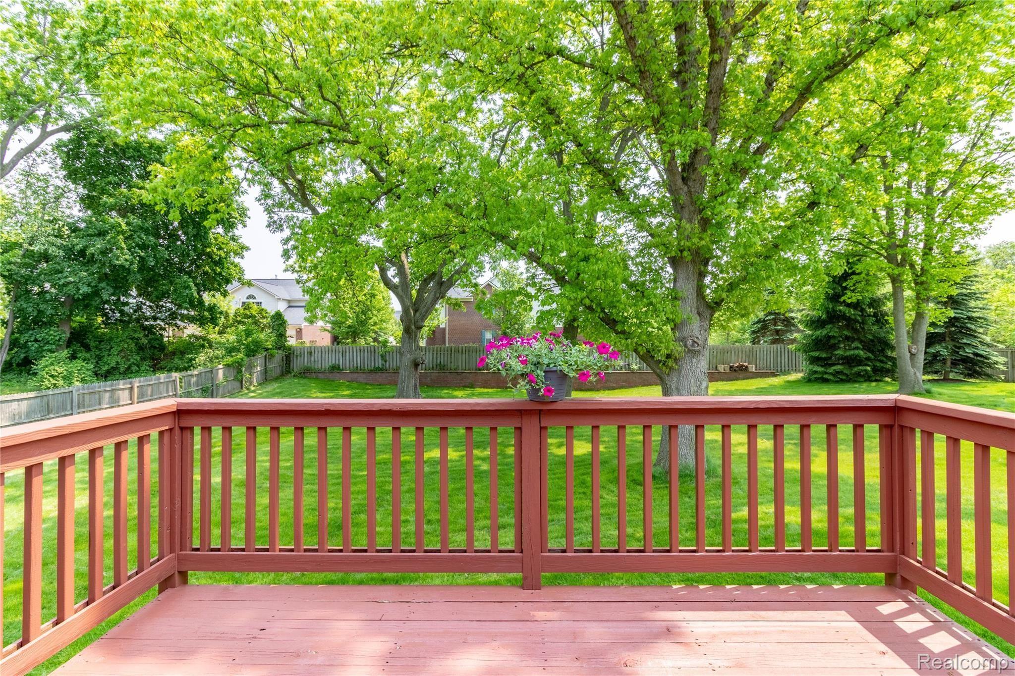 646 Decker Road Walled Lake, MI 48390 - Photo 28 of 39 View of backyard from the deck