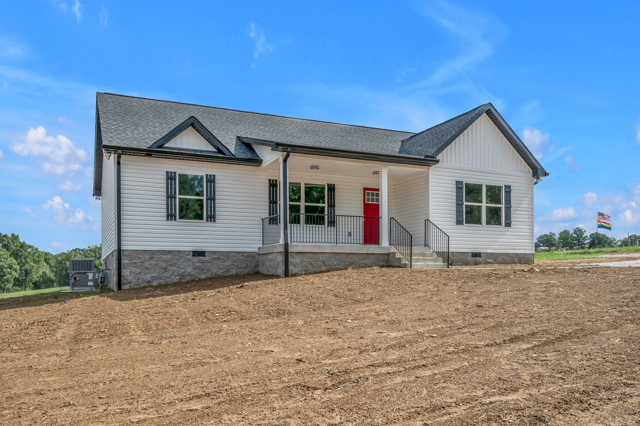 820 Jason Chapel Road Dickson, TN 37055 - Photo 3 of 26 a house with trees in the background