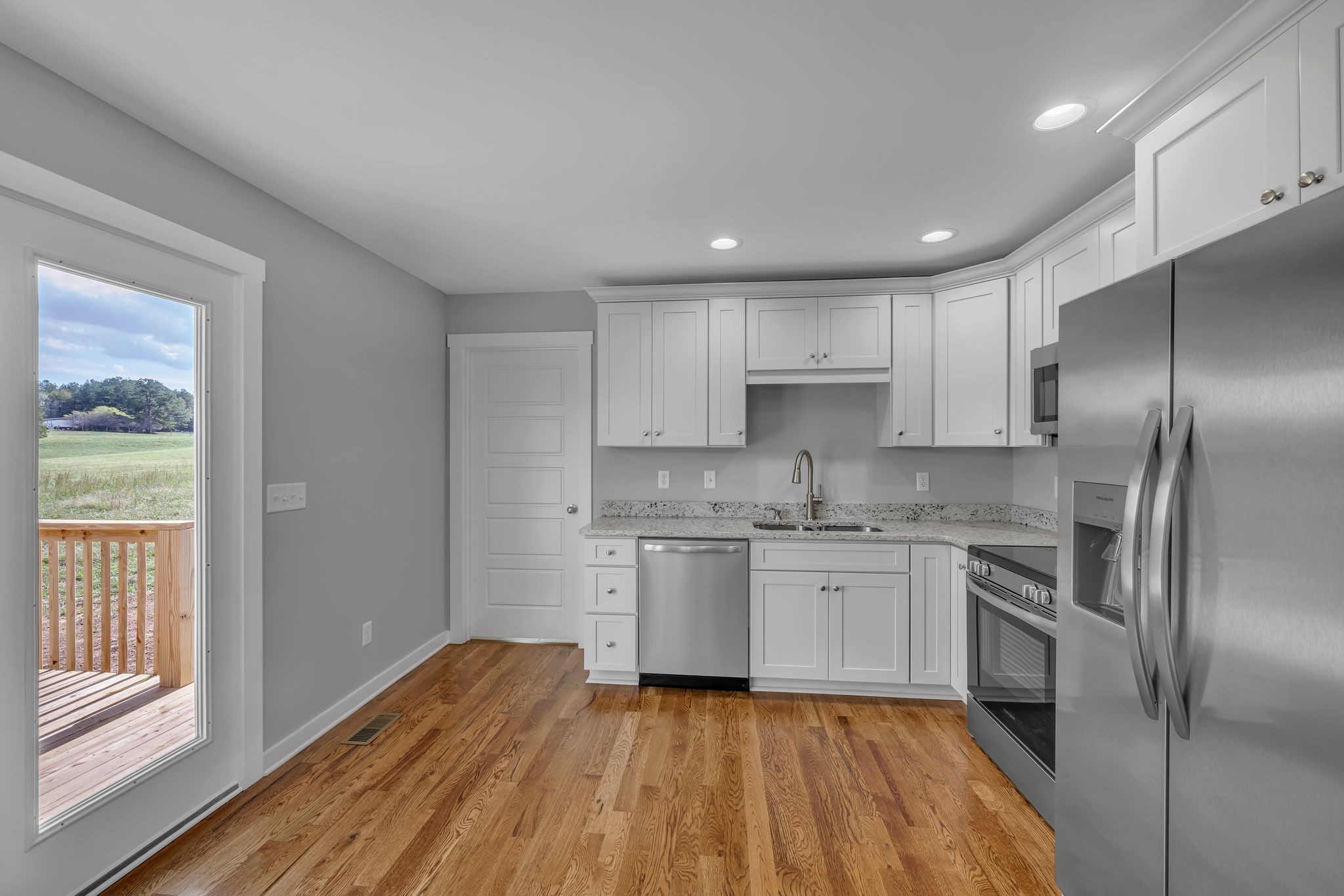 820 Jason Chapel Road Dickson, TN 37055 - Photo 9 of 26 a kitchen with a sink stove and refrigerator