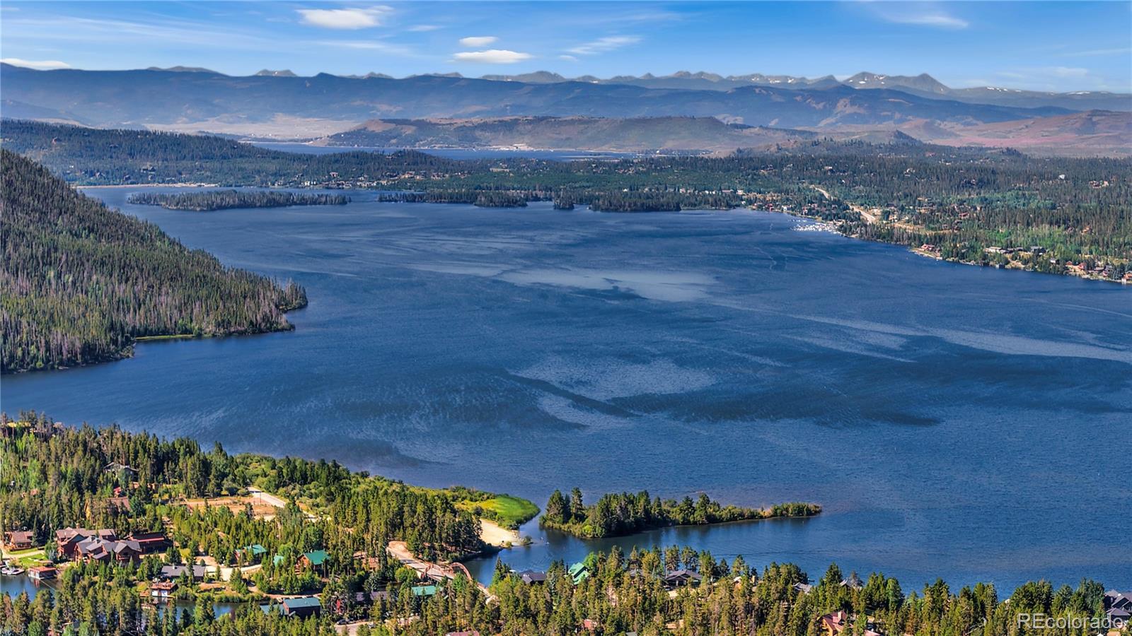 932 Old Tonahutu Ridge Road Grand Lake, CO 80447 - Photo 27 of 34 a view of a lake with mountains in the background