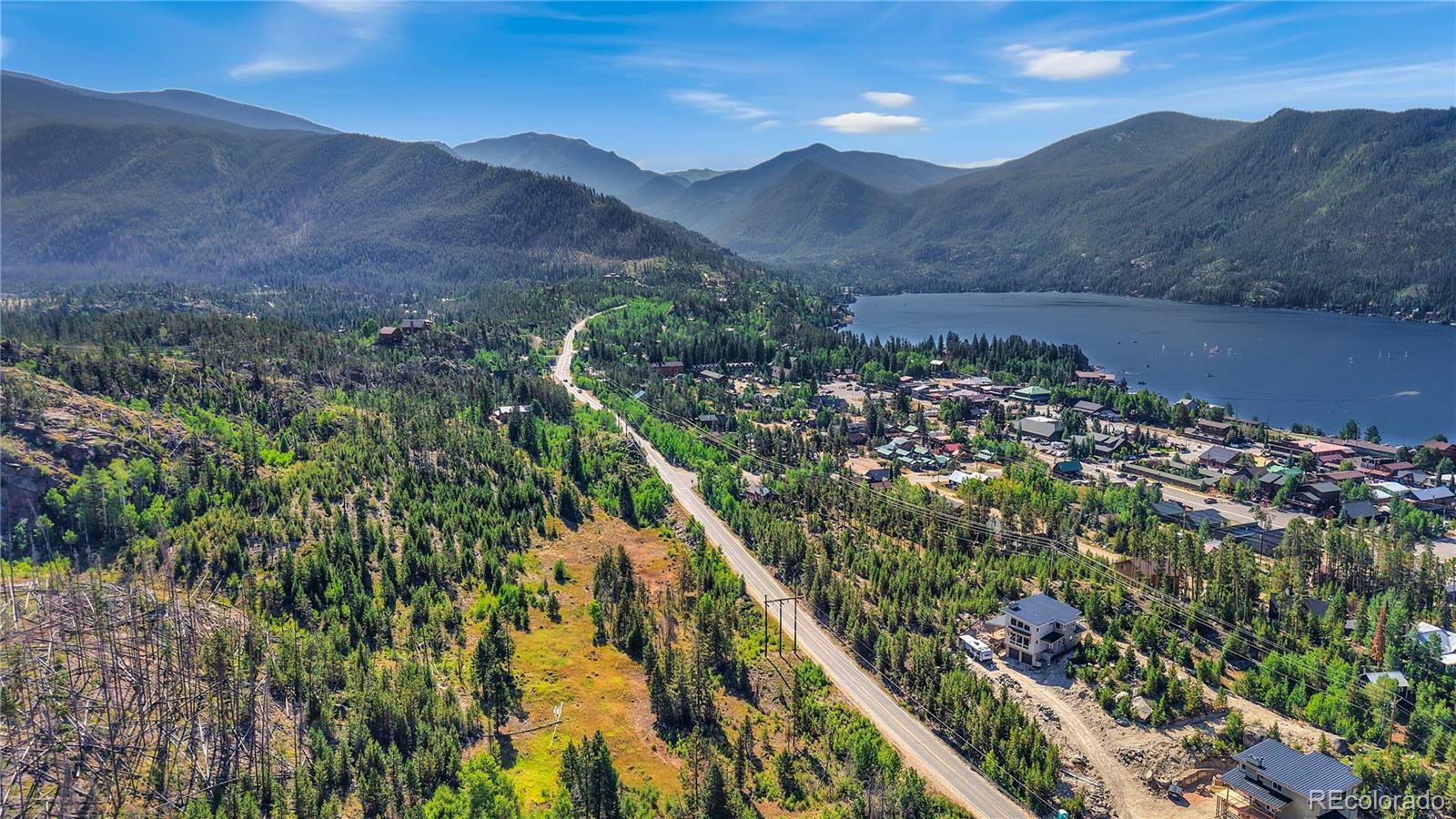 932 Old Tonahutu Ridge Road Grand Lake, CO 80447 - Photo 9 of 34 a view of a lush green hillside and a mountain view