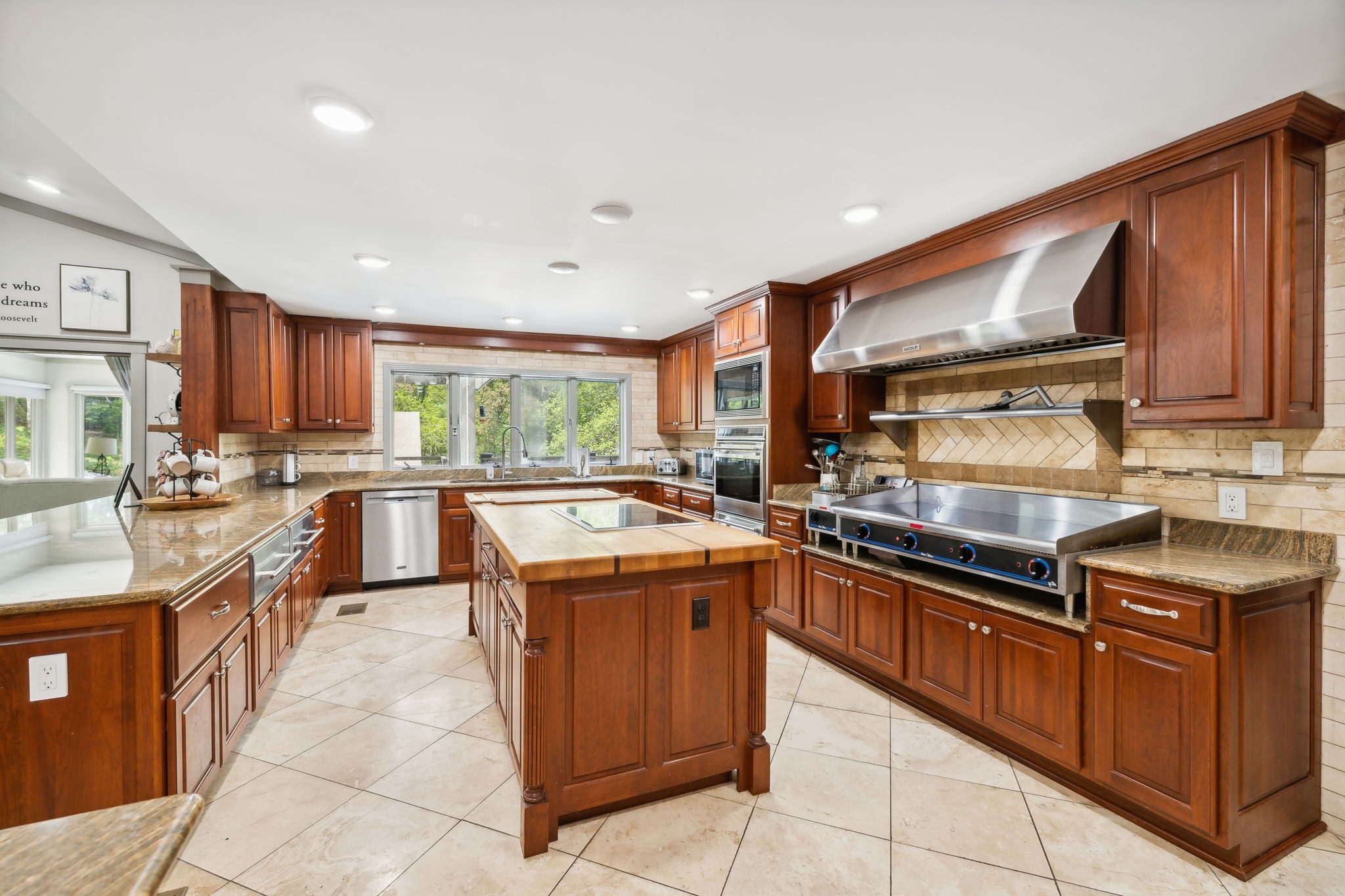 1657 Boswell Road Winchester, TN 37398 - Photo 15 of 70 a kitchen with stainless steel appliances granite countertop wooden cabinets a sink and a stove