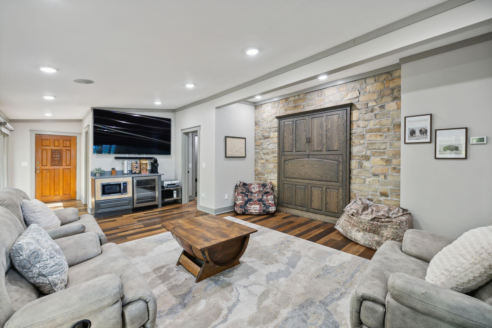 1657 Boswell Road Winchester, TN 37398 - Photo 21 of 70 a living room with furniture flat screen tv and a large window