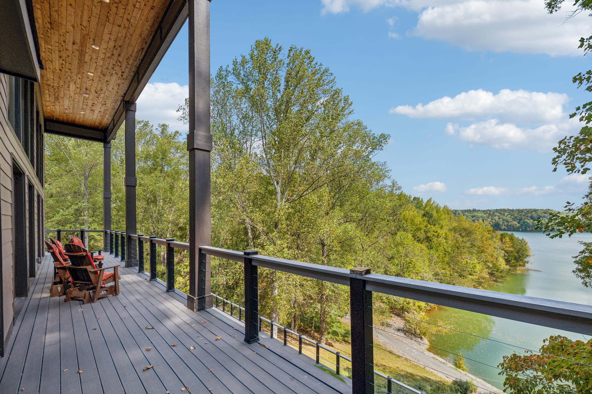 1657 Boswell Road Winchester, TN 37398 - Photo 56 of 70 a view of a balcony with chairs and wooden floor