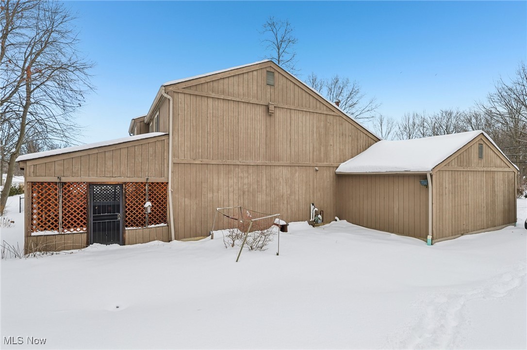 751 Bacon Road Painesville, OH 44077 - Photo 47 of 50 Snow covered property featuring an outdoor structure