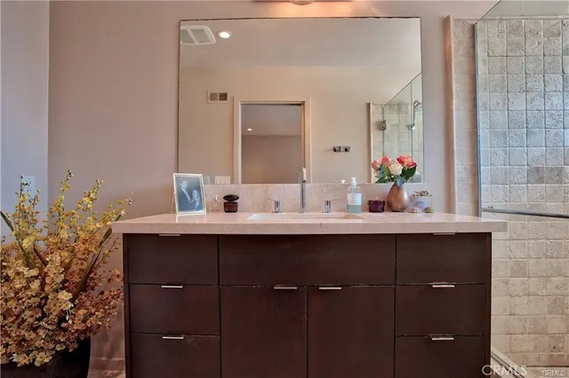 a bedroom with bed and window