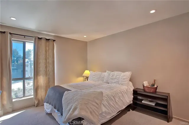a bathroom with a sink double vanity and a mirror