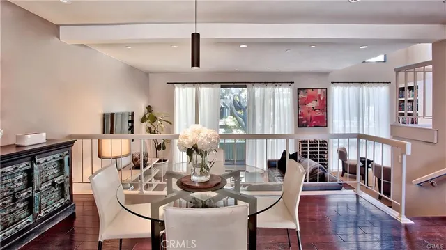 a very nice looking living room with furniture and a large window