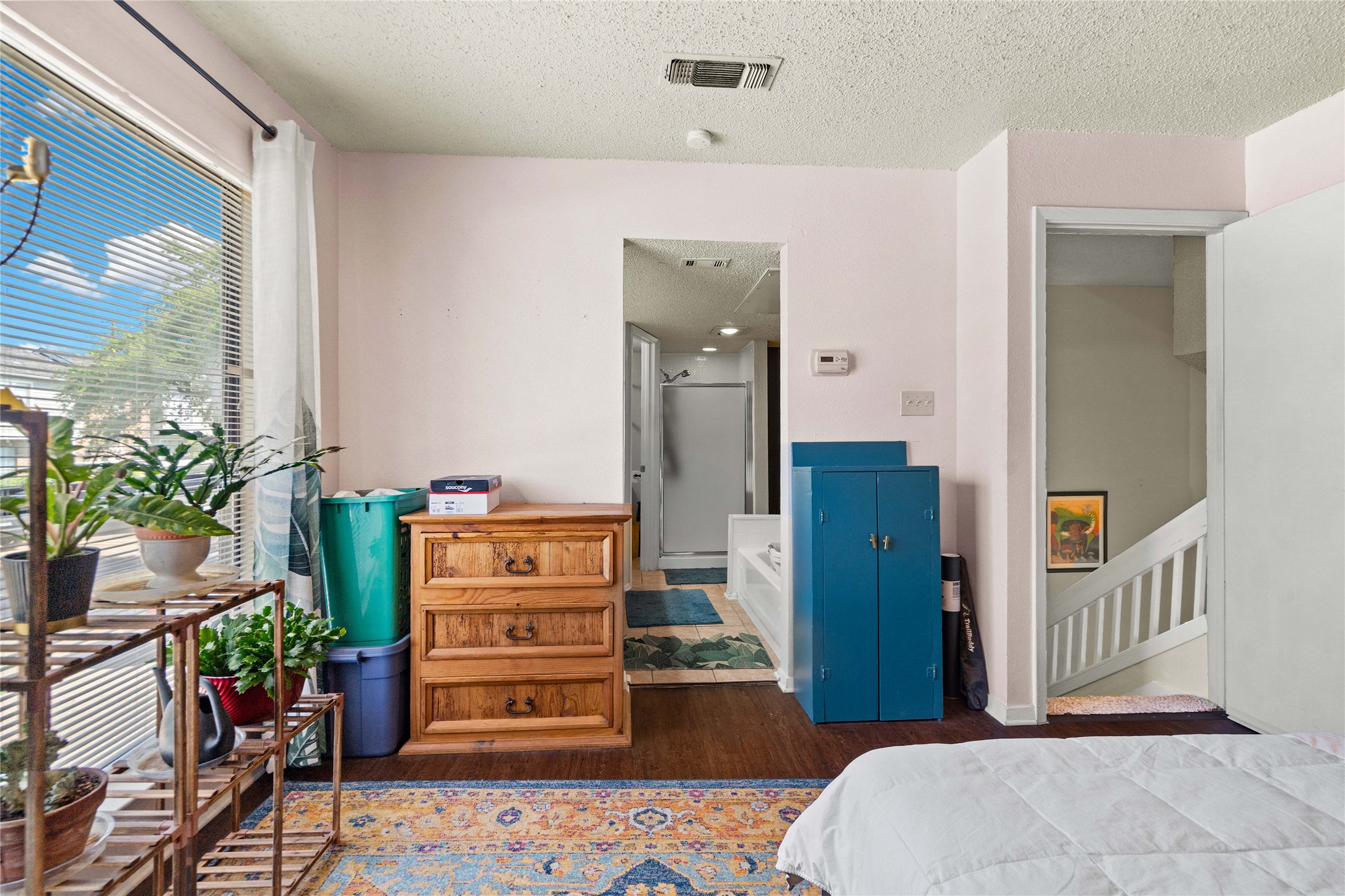 2018 West Rundberg Lane, Unit 4B Austin, TX 78758 - Photo 17 of 28 a view of a hallway with a potted plant