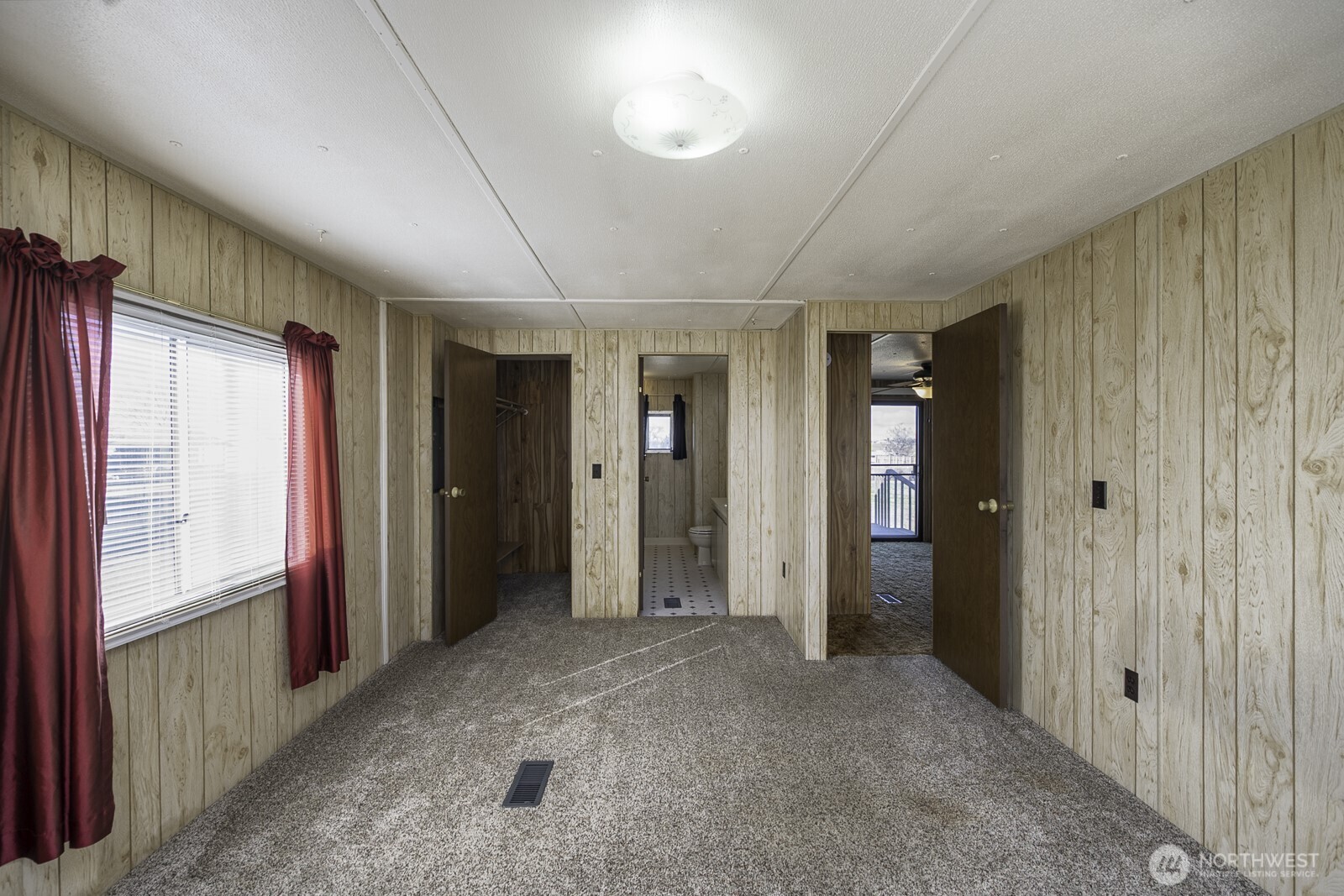 4934 Rd M Northeast Moses Lake, WA 98837 - Photo 18 of 34 an empty room with closet and windows