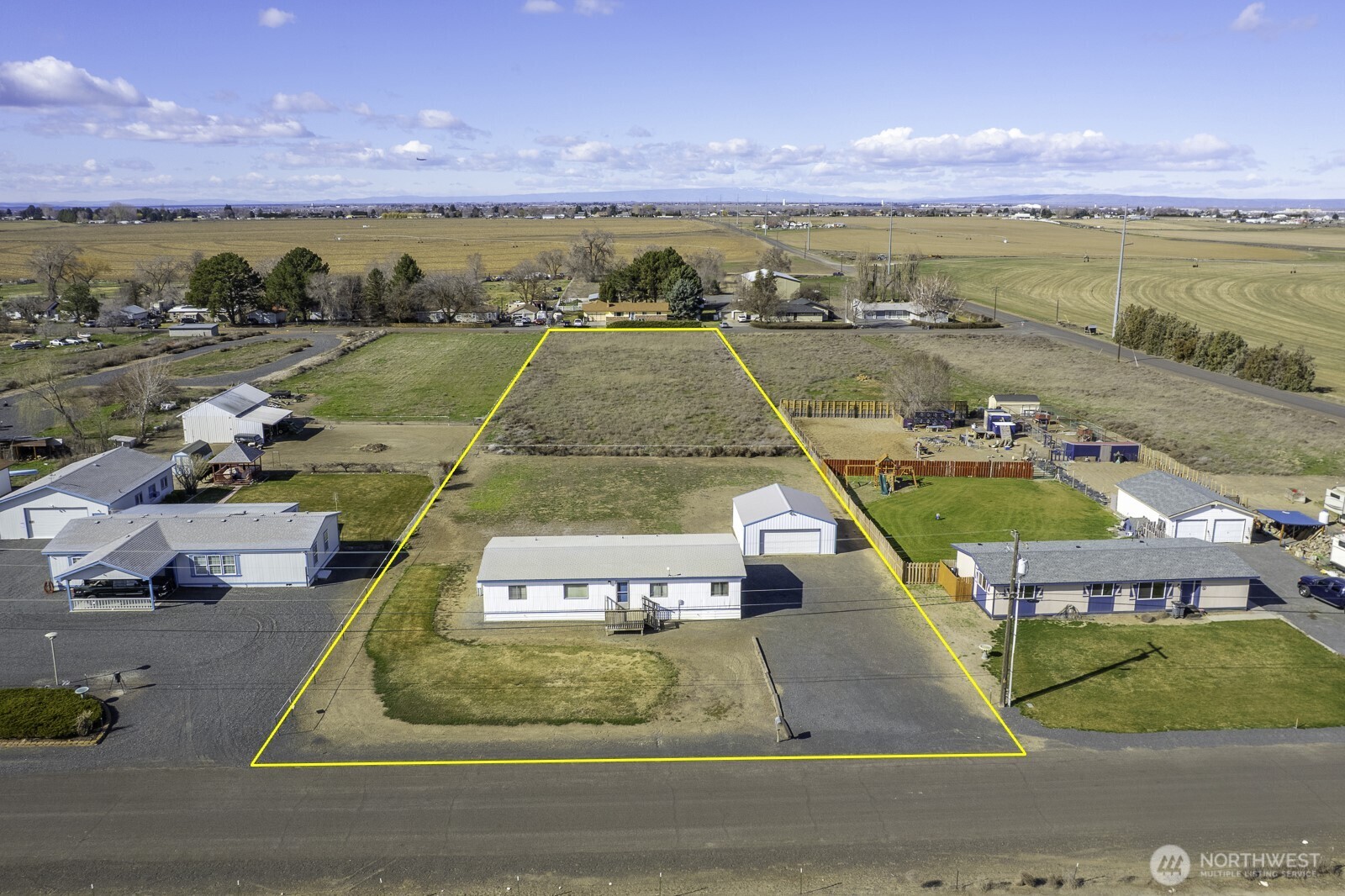 4934 Rd M Northeast Moses Lake, WA 98837 - Photo 5 of 34 an aerial view of a house with a ocean view