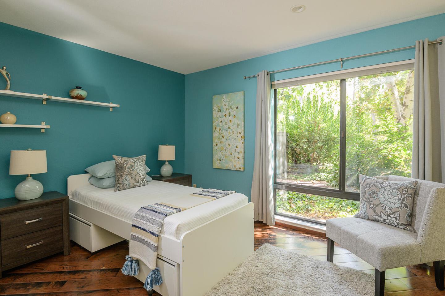 137 Peter Coutts Circle Stanford, CA 94305 - Photo 14 of 28 a bedroom with a bed and wooden floor