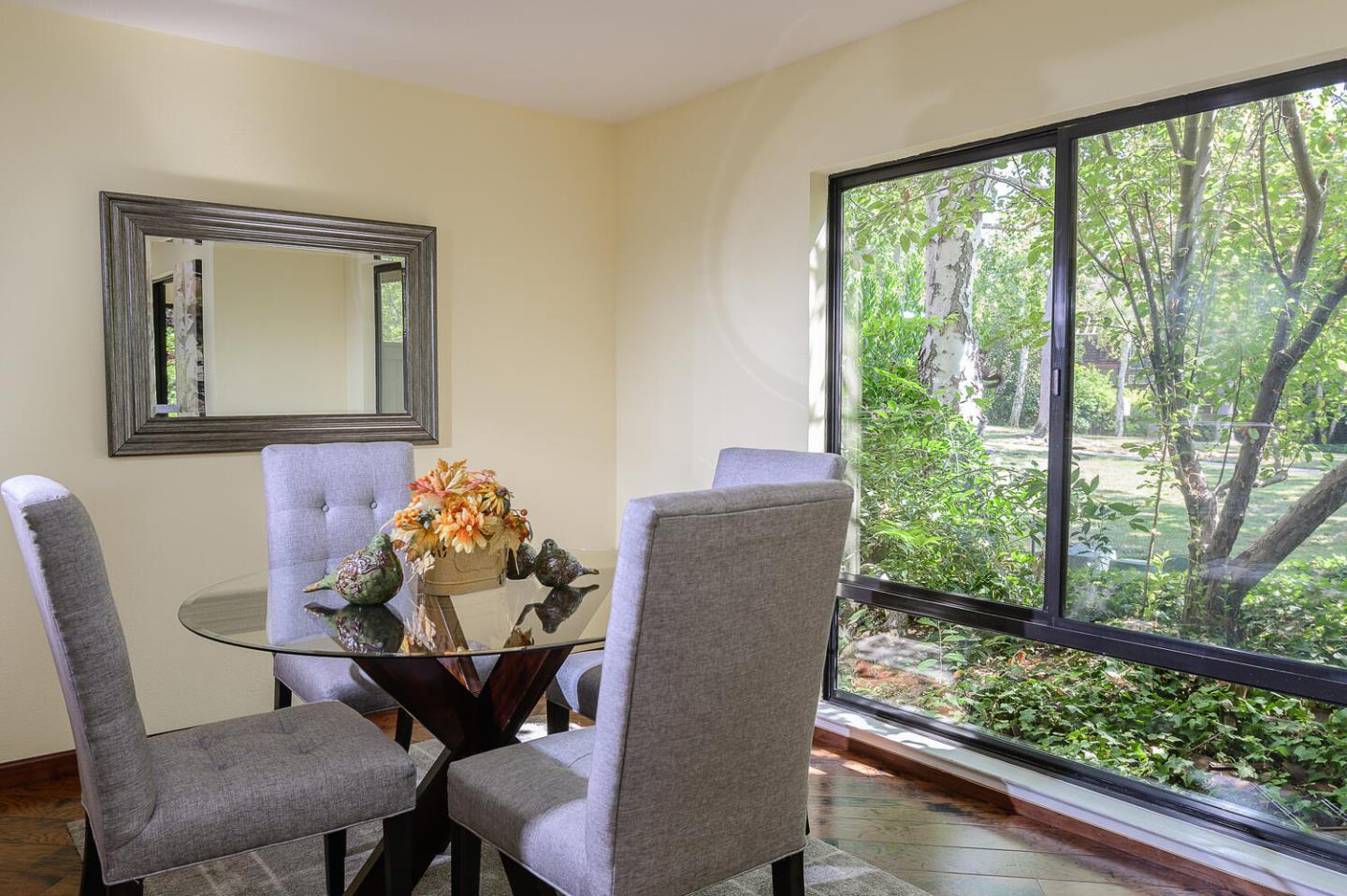 137 Peter Coutts Circle Stanford, CA 94305 - Photo 5 of 28 a view of a dining room with furniture window and wooden floor