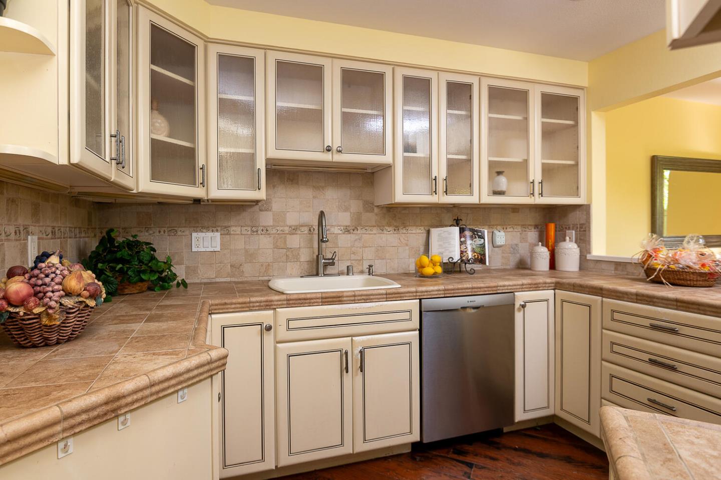 137 Peter Coutts Circle Stanford, CA 94305 - Photo 9 of 28 a kitchen with stainless steel appliances granite countertop white cabinets and window