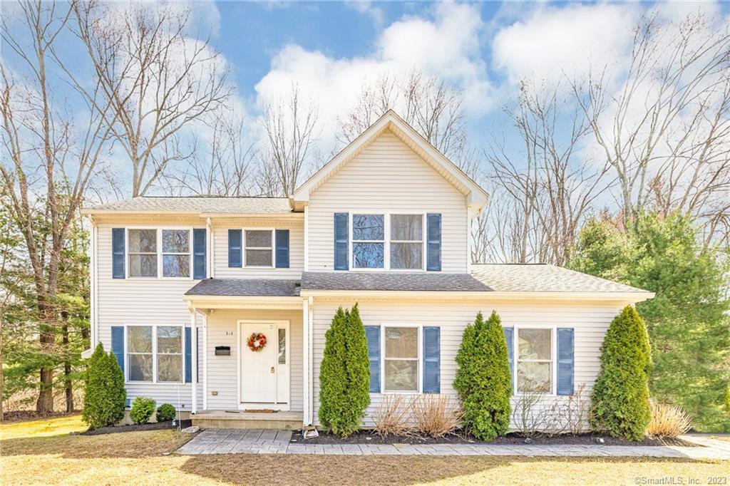 303 Rood Avenue Windsor, CT 06095 - Photo 1 of 1 a front view of a house with a yard and garage