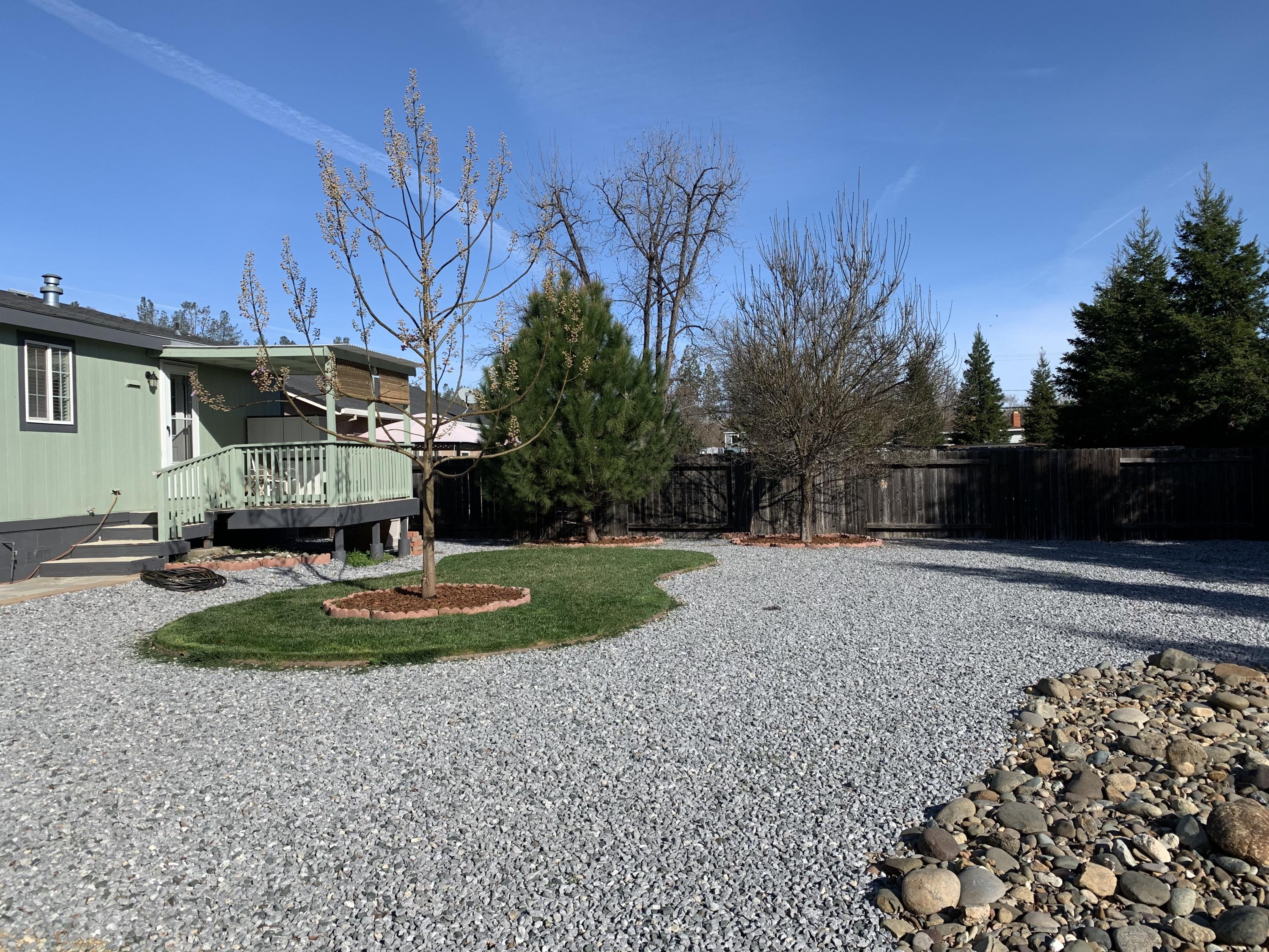 4935 Cedars Road Redding, CA 96001 - Photo 13 of 18 a view of backyard with green space