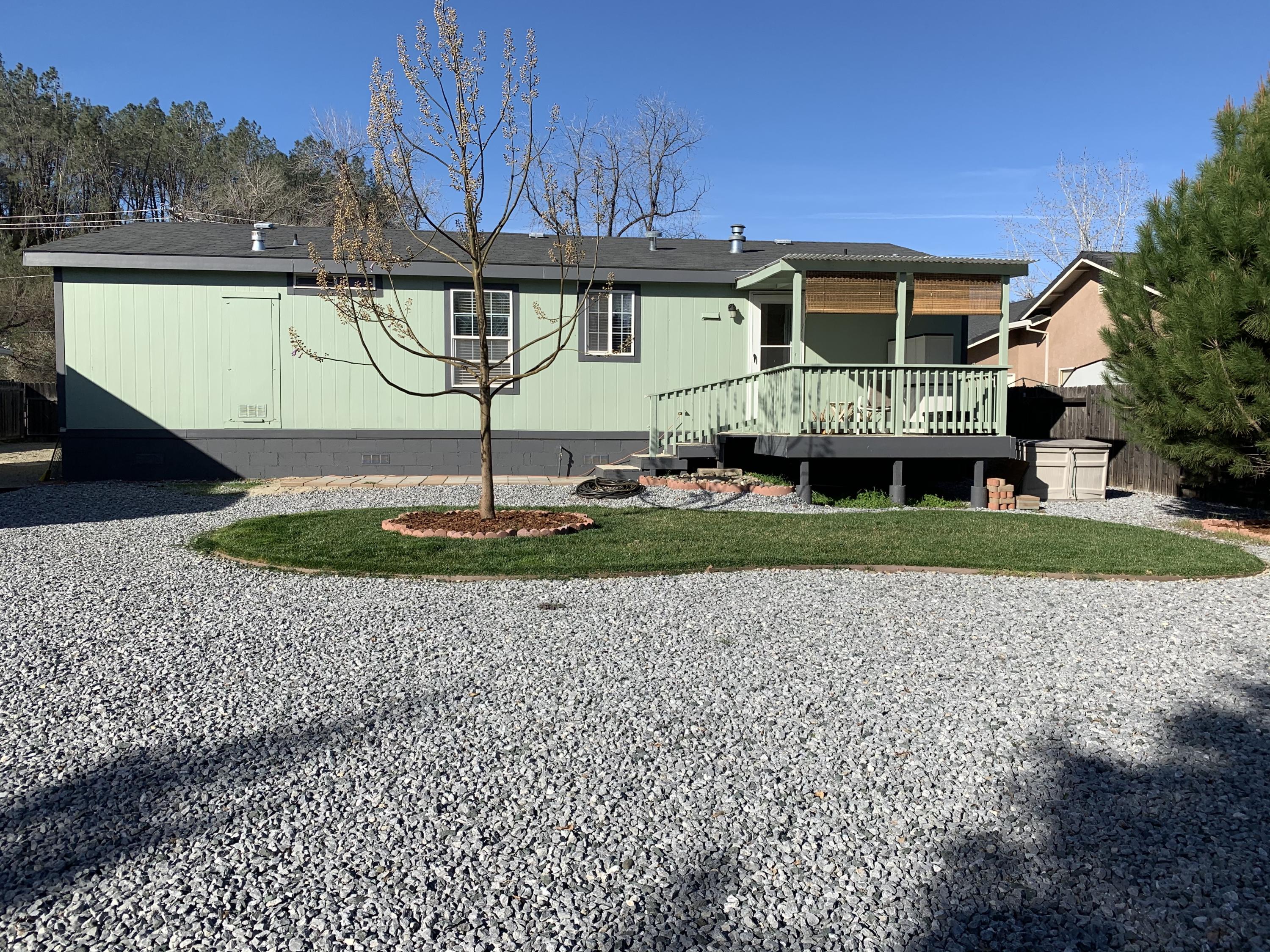 4935 Cedars Road Redding, CA 96001 - Photo 16 of 18 a front view of a house with a yard