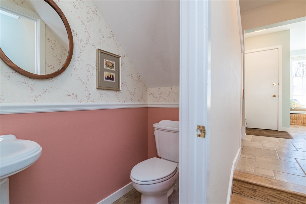 63 Amity Place, Unit 63 Amherst, MA 01002 - Photo 12 of 42 a bathroom with a toilet and a mirror