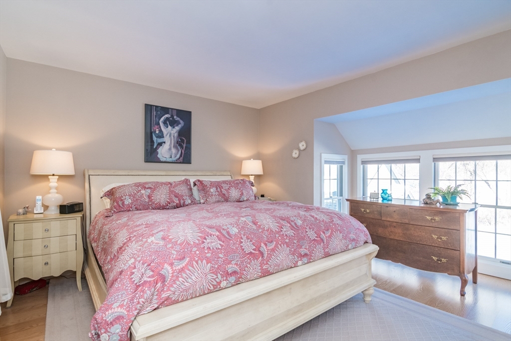 63 Amity Place, Unit 63 Amherst, MA 01002 - Photo 16 of 42 a bedroom with a bed and a couch