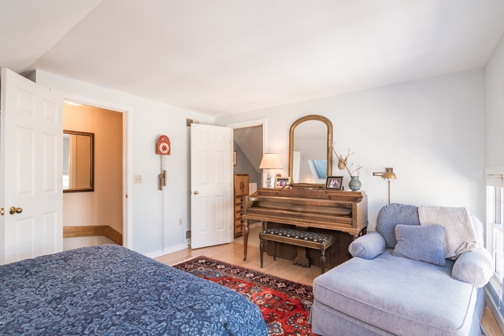 63 Amity Place, Unit 63 Amherst, MA 01002 - Photo 25 of 42 a view of living room filled with furniture and rug