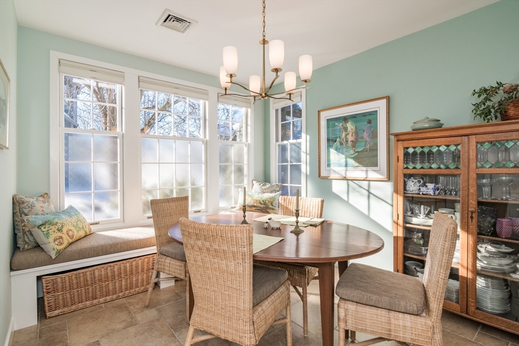 63 Amity Place, Unit 63 Amherst, MA 01002 - Photo 6 of 42 a view of a dining room with furniture window and outside view