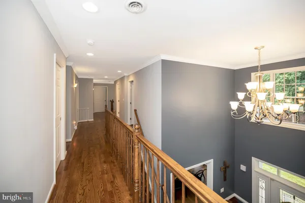 a aerial view of a house with a yard