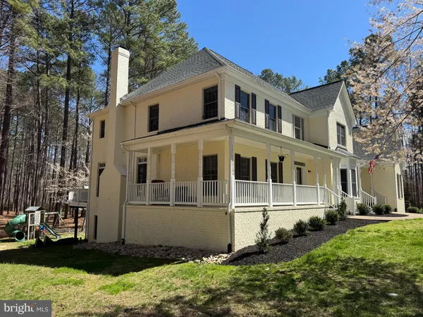 a view of a park with large trees