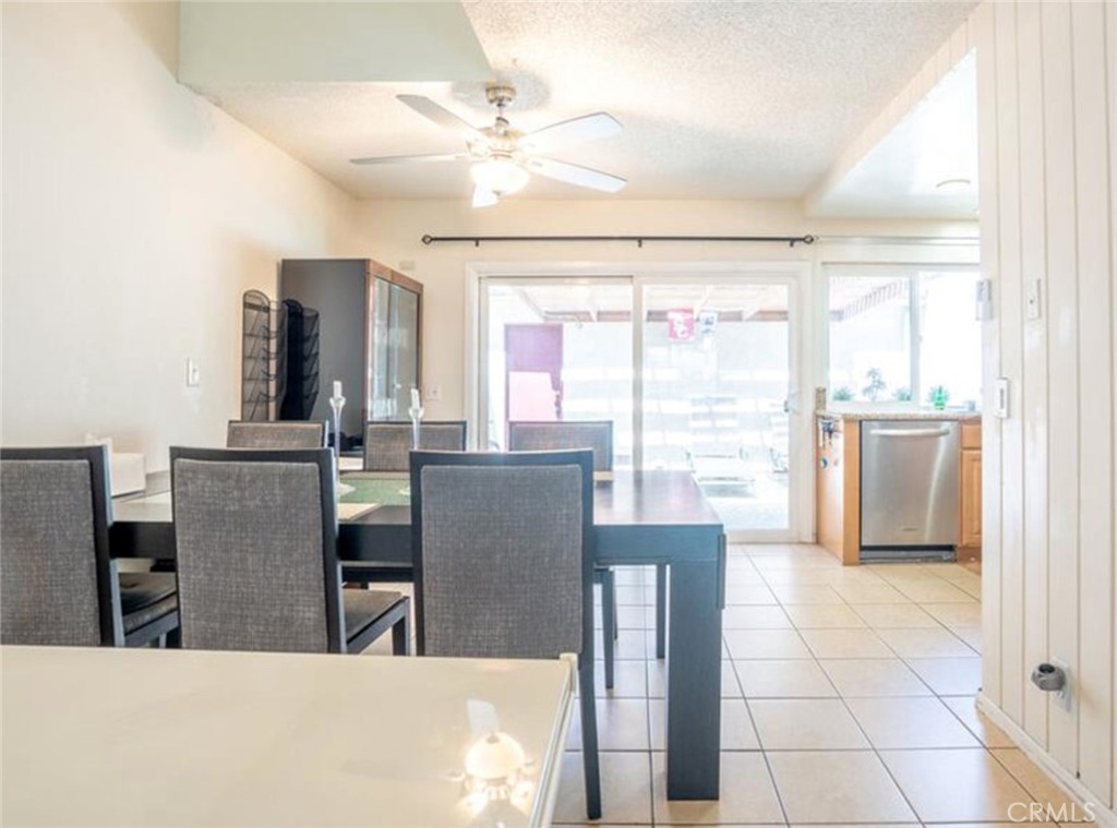 16520 Poppyglen Lane Cerritos, CA 90703 - Photo 11 of 17 a view of a dining room with furniture window and outside view