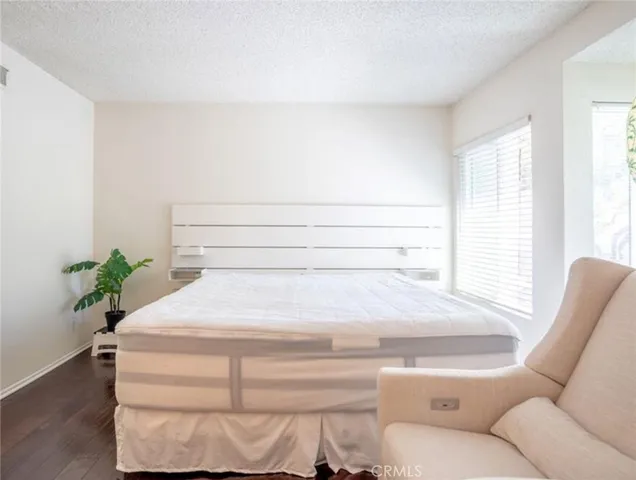 a bathroom with a toilet and a bathtub