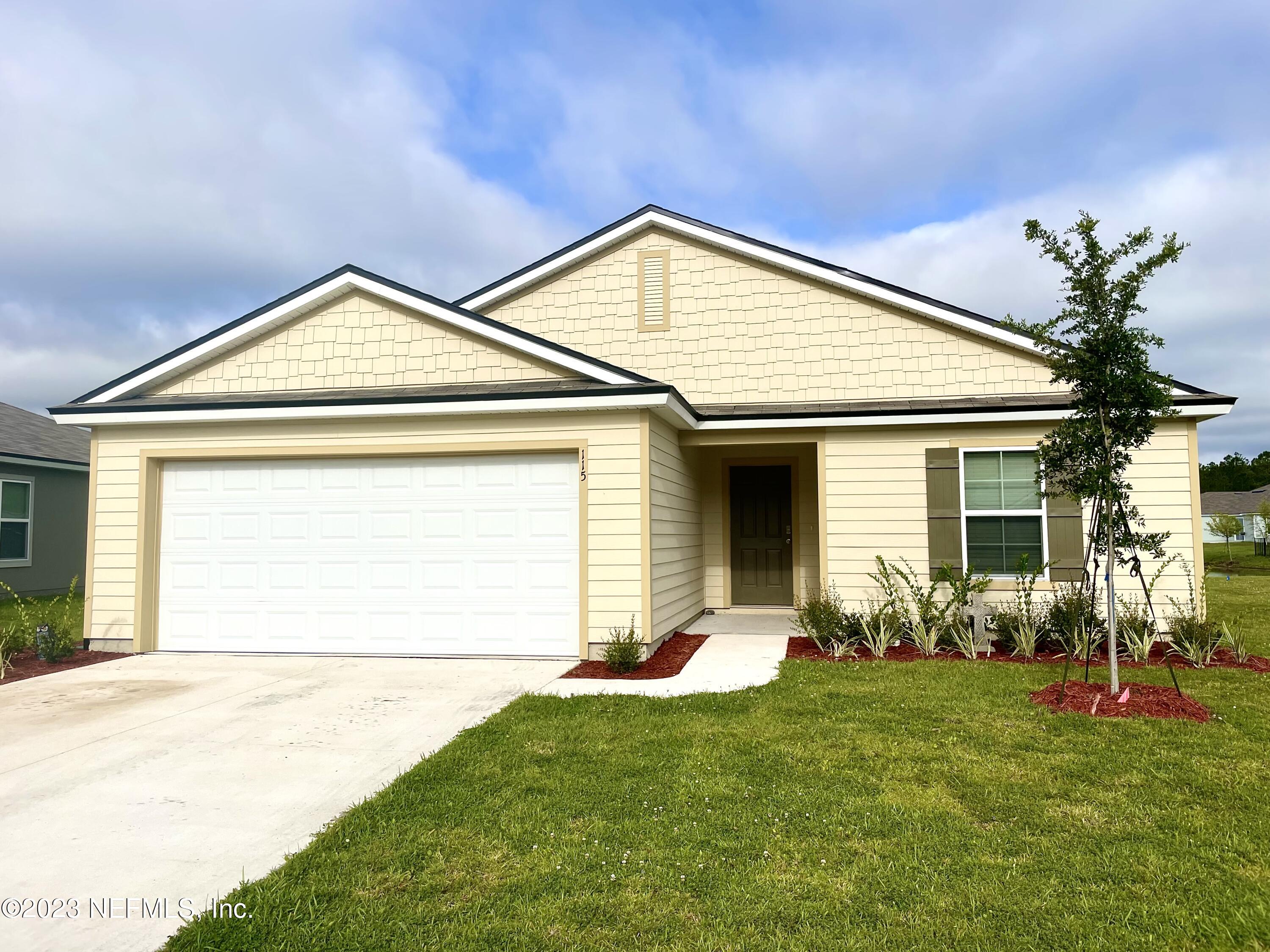 115 Falcon Ridge Road St. Augustine, FL 32084 - Photo 1 of 27 a view of a house with backyard
