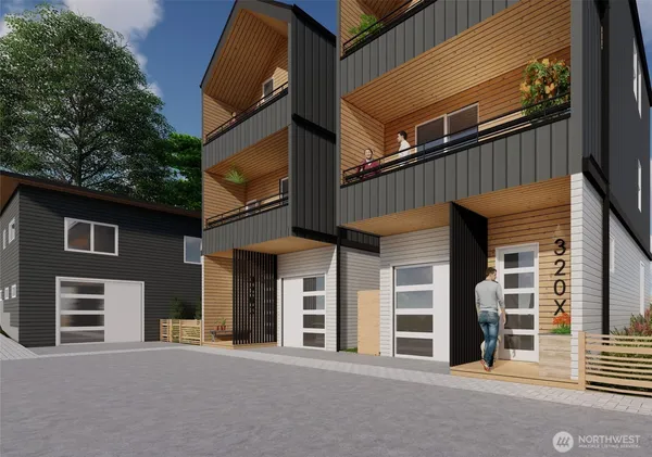 a front view of a house with a garage