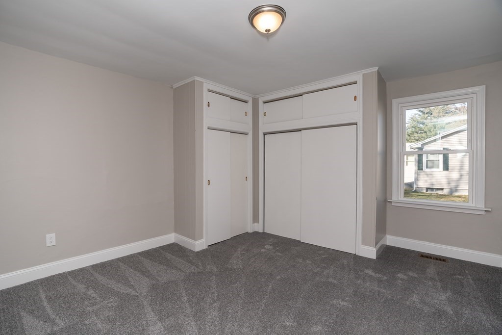 2026 Cross Street Three Rivers, MA 01080 - Photo 23 of 42 a view of an empty room with window and closet area