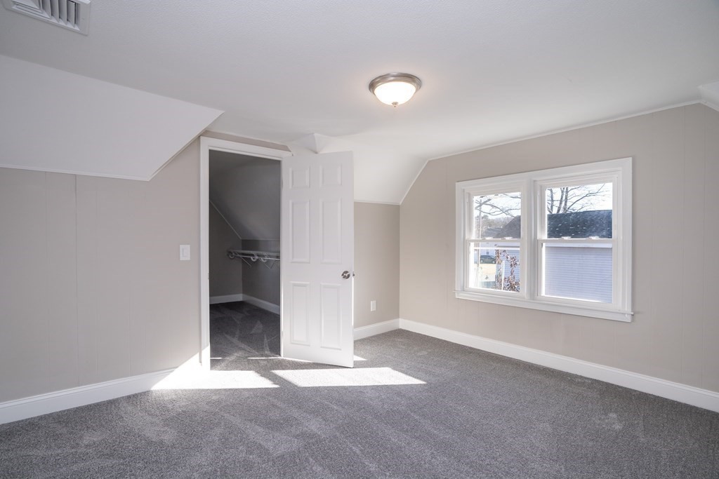 2026 Cross Street Three Rivers, MA 01080 - Photo 26 of 42 an empty room with windows