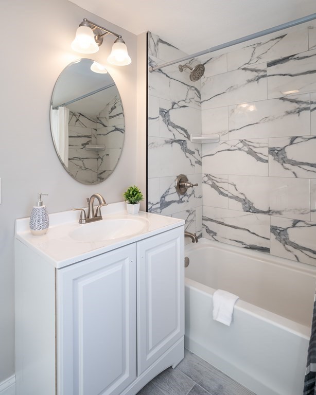 2026 Cross Street Three Rivers, MA 01080 - Photo 31 of 42 a bathroom with a sink and a mirror