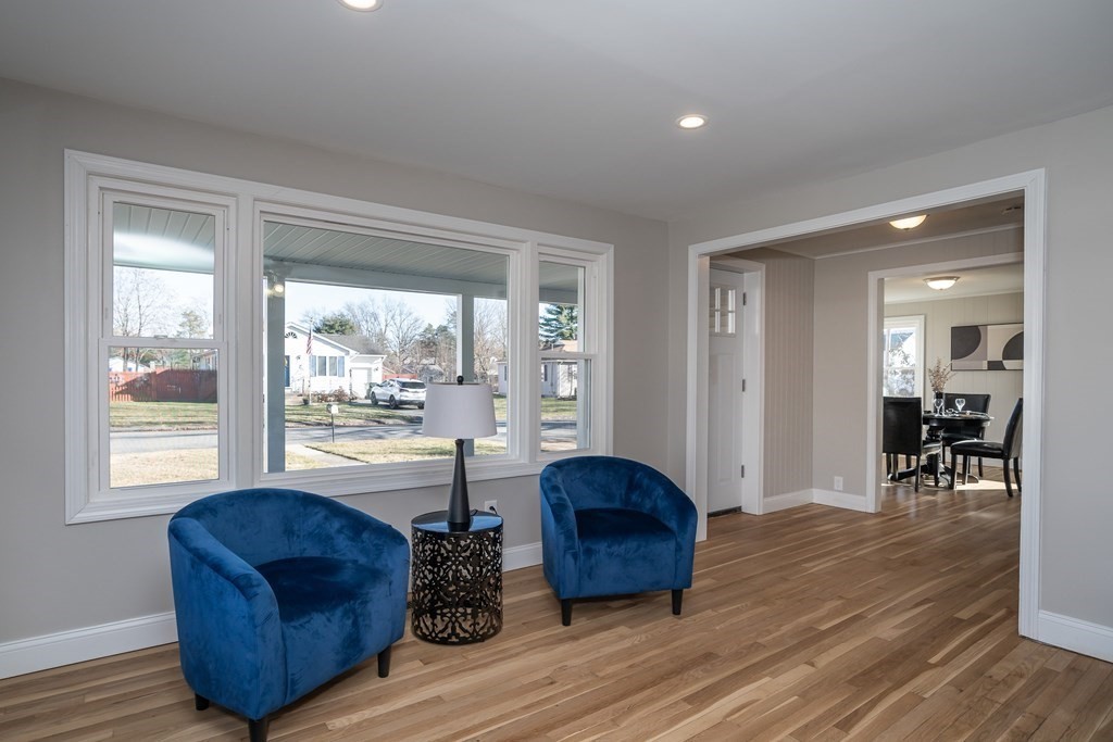 2026 Cross Street Three Rivers, MA 01080 - Photo 8 of 42 a living room with furniture and a window