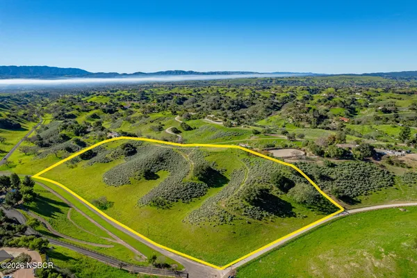 a view of a swimming pool with a balcony