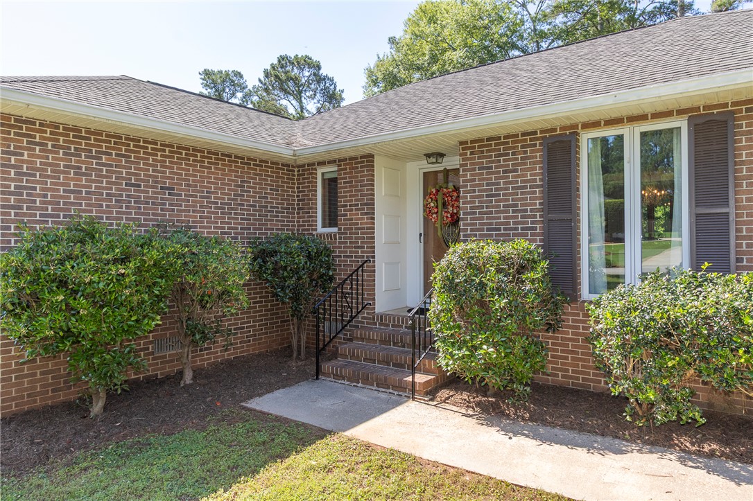 207 Laurel Ridge Road Anderson, SC 29621 - Photo 3 of 50 Brick facade with mature landscaping creates a welcoming entry to this charming residence.